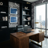 Blueprint wallpaper depicting a city scene, with black shelving and a modern desk in a stylish home office.