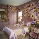 Golden Reverie wallpaper with repeating Pekingese dogs and purple floral designs, covering the entire bedroom.