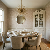 Beige wallpaper with sprigs pattern, from Willowdusk, covering the dining room walls.