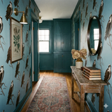Patterned wallpaper with bird illustration, Blackwatch Nest Wallpaper, on blue background.