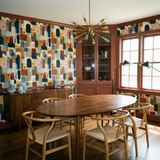 Colorful Sedona Keys Wallpaper with geometric pattern, in a stylish dining room.
