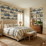 St. Johns River Ledger Wallpaper with blue toile pattern and a detailed scene of houses, bridges, and boats.
