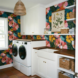 Floral Painter’s Orchard Wallpaper with a colorful, painterly botanical pattern, decorating a laundry room.
