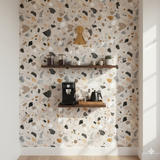 Mineral array wallpaper with earthy terrazzo pattern, perfect for an accent wall.
