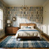 Mesa Ledger Wallpaper with blue and tan vertical stripes pattern.