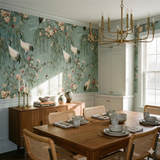 Floral and crane patterned wallpaper by Anthropologie in a dining room setting.
