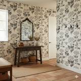 Floral pattern wallpaper by Wallshoppe, showing stylized botanical motifs in gray and white.