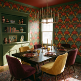 Tulip Arcade Wallpaper with floral pattern on a dark green background.
