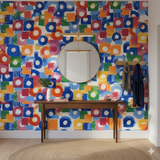 Colorful wallpaper with circle and square pattern by Color Theory, adorning a modern interior.
