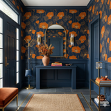 Saffron Silhouette Wallpaper with orange floral pattern on navy background.
