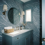 Glacialis Vein wallpaper with branches pattern, no brand provided, in a modern bathroom setting with light and dark hues.