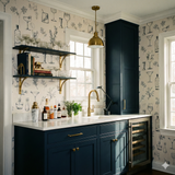 Tonic Sketches Wallpaper with cocktail and botanical pattern, covering walls in a stylish kitchen area.
