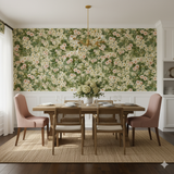 Marigold Meadow wallpaper with a daisy and marigold floral pattern, covering the dining room wall.
