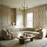 Patterned wallpaper with flowing design, by Wovenshore, in beige and white tones and textured finish.
