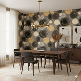 Patterned Orrery wallpaper with gold and black circles against a neutral wall.