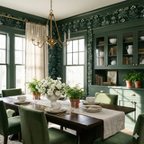 Veridian Apothecary Wallpaper with a botanical design, showing green hues and off-white floral details.