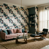 Abstract patterned wallpaper with geometric shapes and watercolor effects, in a modern living room setting.