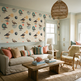 Seagull patterned wallpaper from Tideline, featuring blue, peach, and beige circular accents.