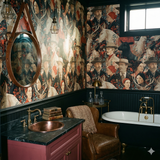Rosethorne Kinship Wallpaper with figures and animal motif, covering bathroom walls.