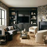 Patterned wallpaper in gold, black and white featuring a wavy design.