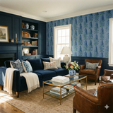 Blue floral patterned wallpaper with larkspur columns, no brand attribution, set in a traditional living room.