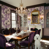 Patterned wallpaper of poodles by Versailles Vogue, covering the walls of a formal dining room.