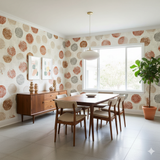 Patterned Jaipur Seal wallpaper with orange and gray circles, covering the walls of a modern dining room.
