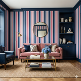 Striped wallpaper in navy, pink, and cream, with a matching navy trim.