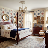 Heirloom Quilt Stars Wallpaper with star patterns in red and blue against a neutral background.
