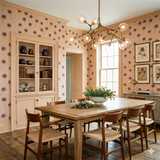 Floral scatter wallpaper with a clover pattern on a peach background.
