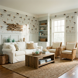Seagull patterned Saltwind Wallpaper with a white wainscot and wood accent.