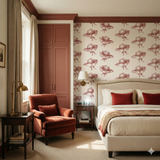 Patterned Bridle Rue Wallpaper with red hats from Bridle Rue against off-white, styled in a bedroom setting.
