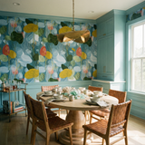 Patterned Tidewaltz Wallpaper with colorful floral design, covering the walls in a room with a dining table.