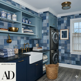 Indigo patchwork atelier wallpaper with blue tones, patterned with squares, decorative laundry-themed styling.