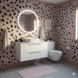 Freya Spot wallpaper with a pink and black spotted pattern.
