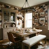 Brindle Quarry wallpaper with earth-tone abstract pattern on the walls, in a room styled with rustic furniture.