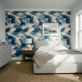Bluewash terrain wallpaper in a camo pattern by Seabrook Wallcoverings, accenting a contemporary bedroom with light gray furniture.
