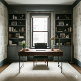 Stafford Etude Wallpaper with dog pattern, covering the walls of a home office with dark green built-in bookcases.