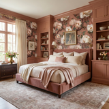 Floral peony wallpaper with botanical patterns, filling a bedroom wall behind a velvet bed.