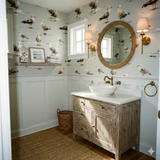 Seagull print wallpaper with pale gray background, saltwind pattern from York Wallcoverings, and coastal-inspired bathroom styling.
