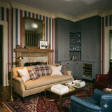 Striped Regatta Column Wallpaper in blue, red and beige, with a classic column pattern.
