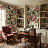 Windsor Rosarium wallpaper with floral and dog pattern, decorating an office space with bookshelf and desk.