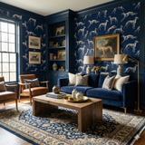 Nightstride Whippets wallpaper with blue background featuring dog illustrations from Schumacher, adorning the walls of a living room.