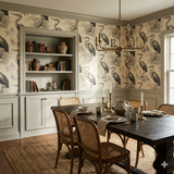Magnolia Marsh wallpaper with a crane pattern, covering the dining room walls and built-in bookcase.