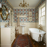 Patterned wallpaper with blue and red floral motifs, decorative wainscoting, and a vintage-style bathroom.