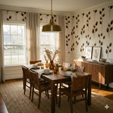 Fieldscript wallpaper with a botanical pattern, visible behind a dining table, with a large window and console table in view.