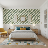 Greenvale Wallpaper with green leaf pattern on a cream background.