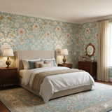 Azure floral wallpaper with gold accents, and vintage inspired pattern on all walls in a bedroom.