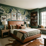 Snowmass Atlas Wallpaper with mountain pattern, decorating bedroom walls with framed Aspen ski posters and leather bed.