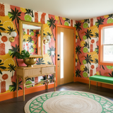 Tropical wallpaper featuring palm trees and citrus fruit patterns.